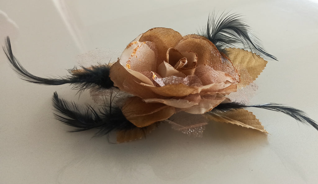 Women's Brooches red sand color with Black feathers for enhance your style.