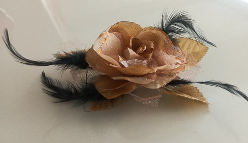 Women's Brooches red sand color with Black feathers for enhance your style.